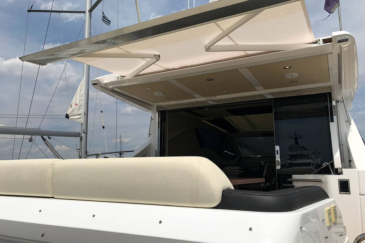 Electrical awning for aft cockpit