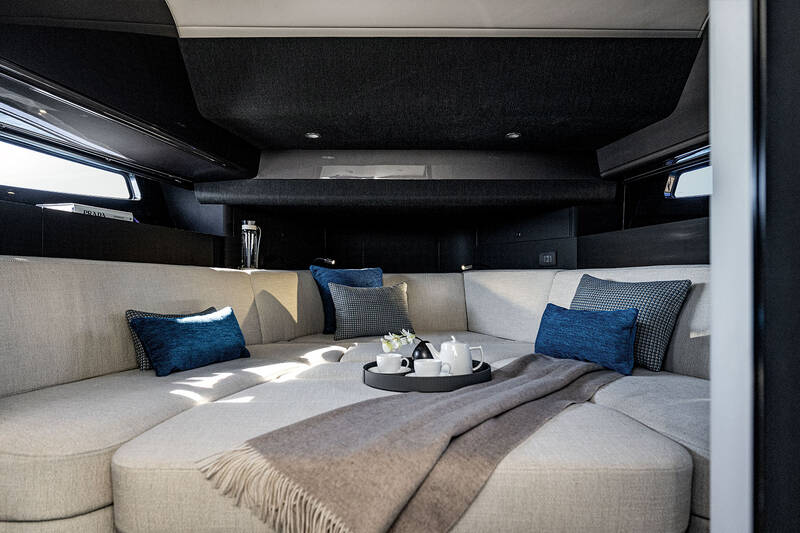 Dining area convertible in additional berth