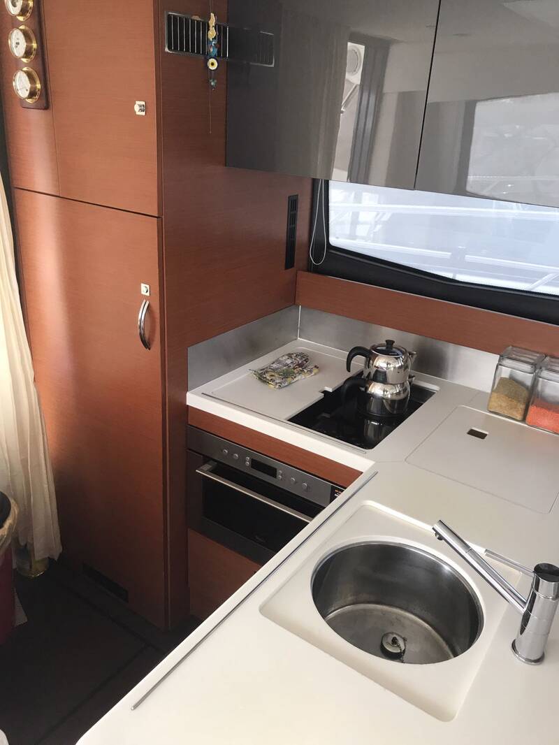 The kitchen is on the left side