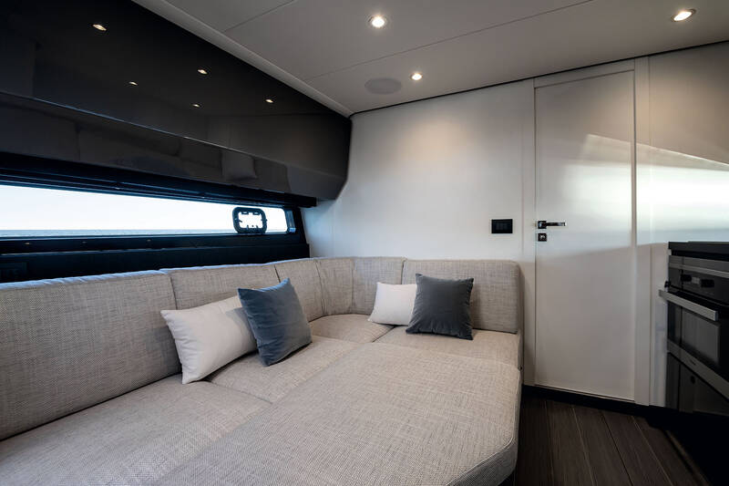 Dining table convertible in additional berth