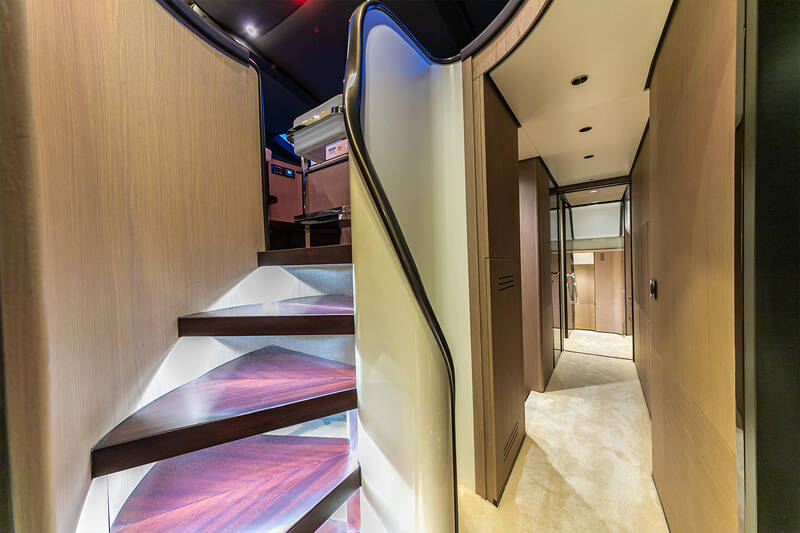 Steps to wheelhouse and entrance to owner's cabin