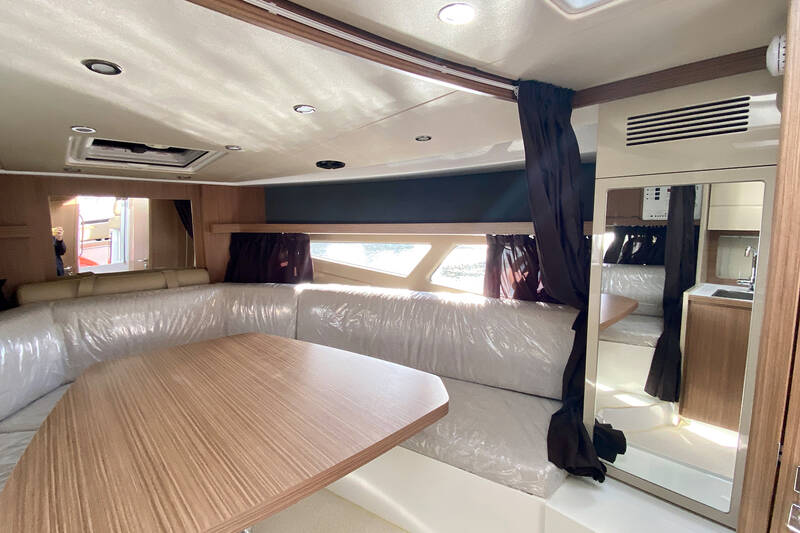 Table in dinette with hi-lo system convertible in sleeping berth